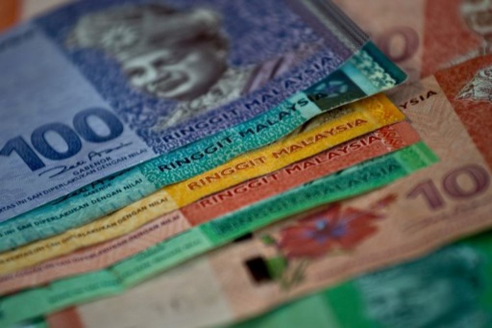 Ringgit opens lower against US dollar