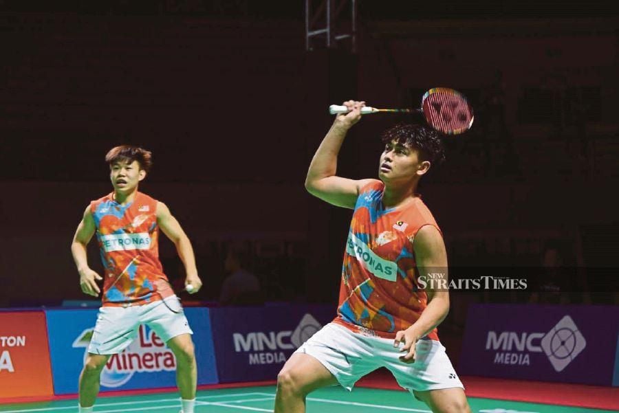 Aaron-Khai Xing crowned world junior badminton champions